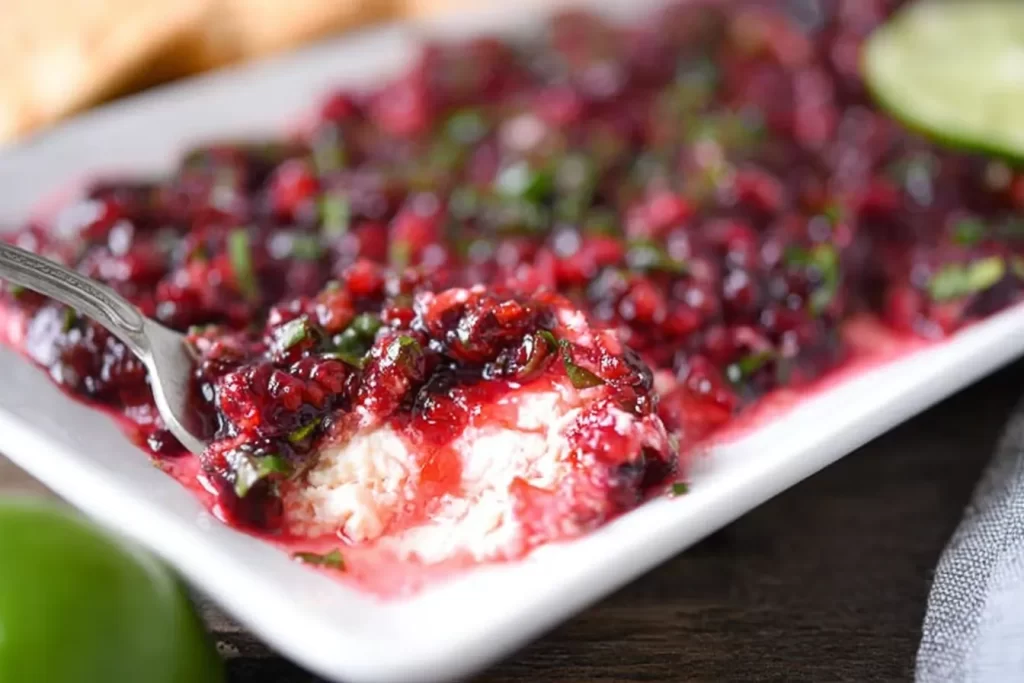 Cranberry Jalapeno Dip in a Bowl with Garnish